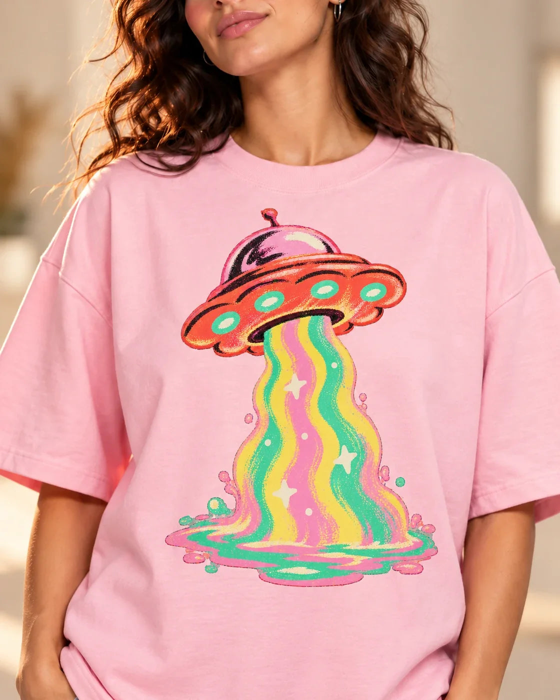 Strawberry Signal print close-up: coral saucer and drippy pink, yellow and mint beam on light baby pink French terry
