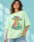 Model wearing the Tropical Transmission UFO oversized tee in jade – Fourth Dimension Club