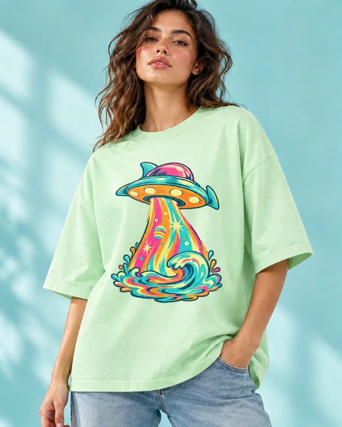 Model wearing the Tropical Transmission UFO oversized tee in jade – Fourth Dimension Club