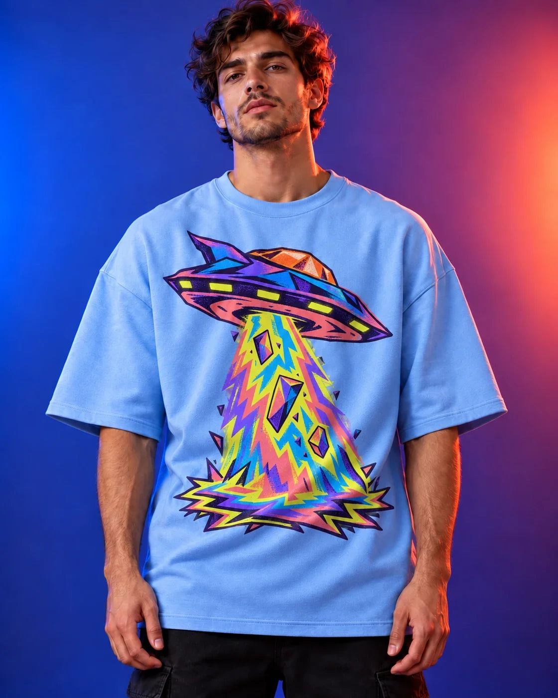 Model wearing the Arcade Anomaly UFO oversized tee in baby blue – Fourth Dimension Club