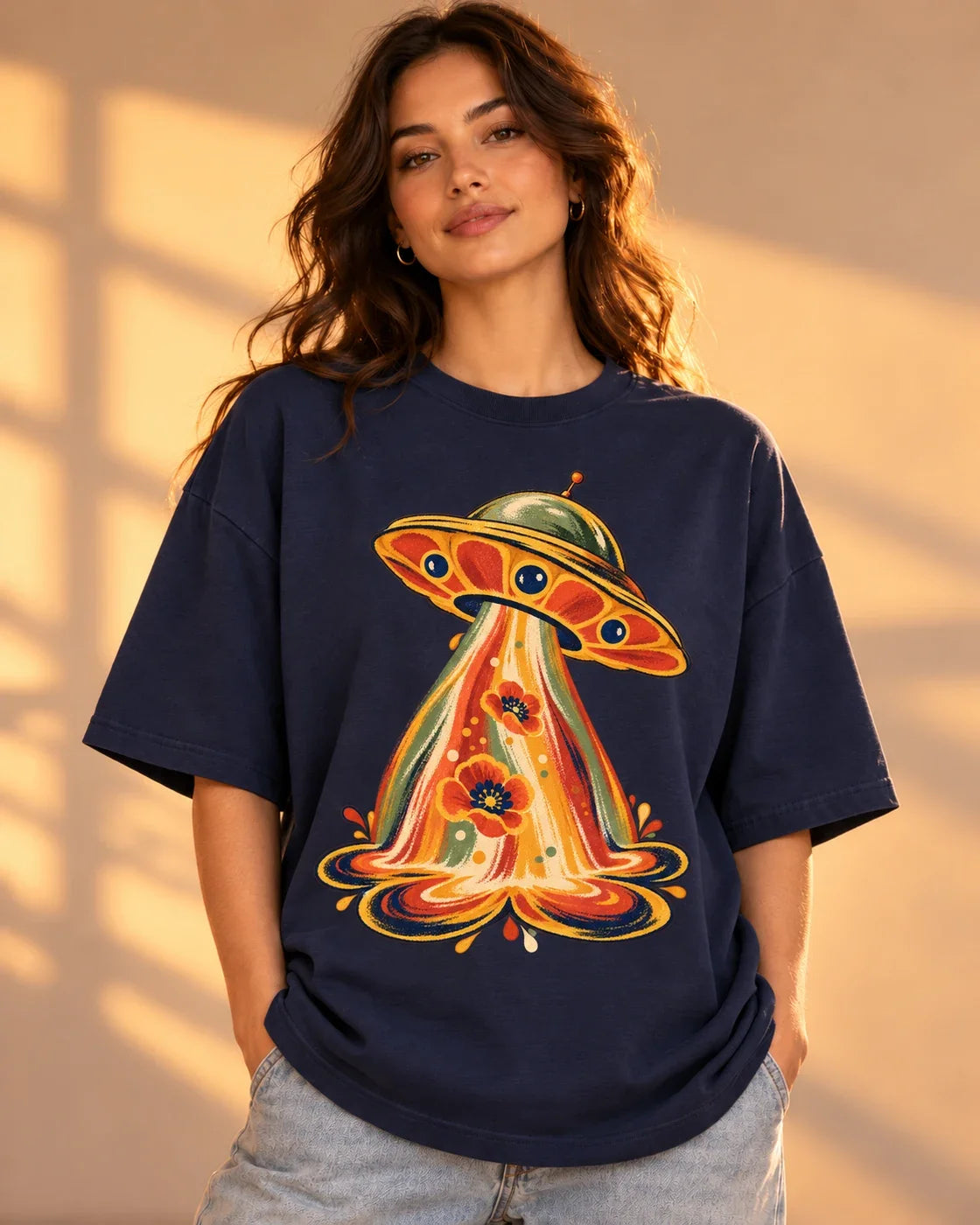 Model wearing the Solar Bloom UFO oversized tee in navy blue – Fourth Dimension Club