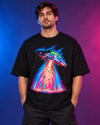 Model wearing the Hyperdrive Signal UFO oversized tee in black – Fourth Dimension Club