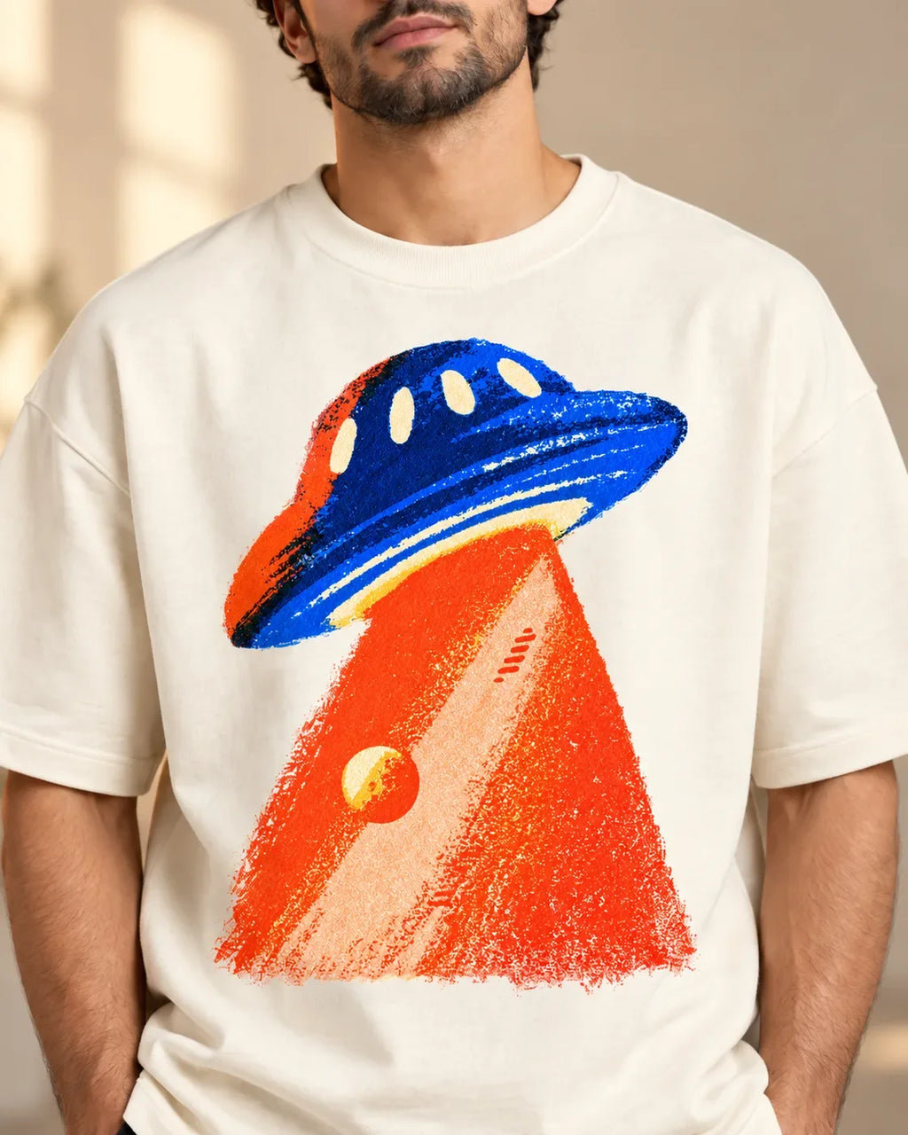 Cobalt Ember print close-up: cobalt saucer and flame-orange crayon-textured beam on off-white French terry