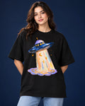 Model wearing the Lunar Haze UFO oversized tee in black – Fourth Dimension Club