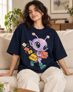 Woman on a sofa in a navy blue oversized French terry t-shirt with a lilac alien with a yellow satchel delivering letters