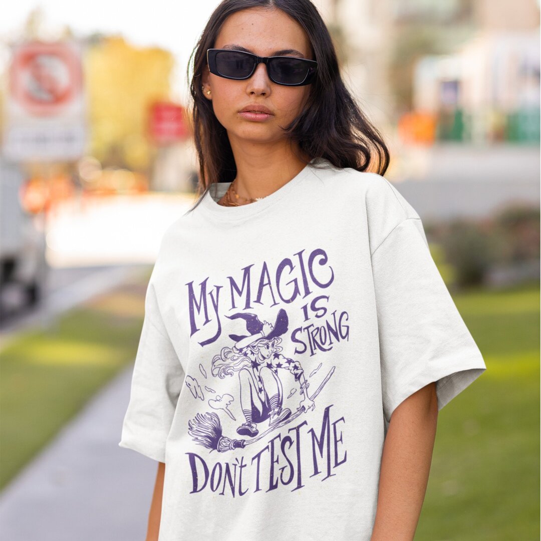 Magic Is Strong Unisex Oversized T-Shirt — front view