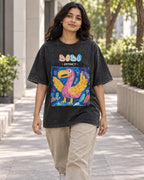 Model wearing the Dodo black acid wash oversized T-shirt on a city street, Fourth Dimension Club