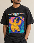 Close-up of the Giant Ground Sloth Ancient Archives print on a black acid wash oversized T-shirt