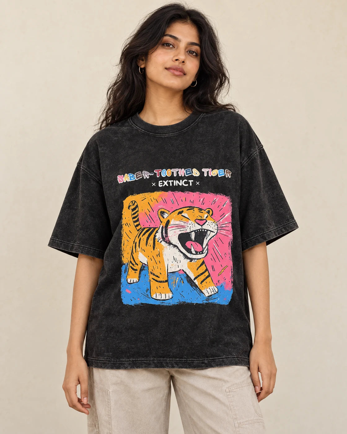Saber-toothed Tiger black acid wash oversized T-shirt from the Ancient Archives collection by Fourth Dimension Club, front view on model