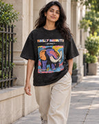 Model wearing the Woolly Mammoth black acid wash oversized T-shirt on a city street, Fourth Dimension Club