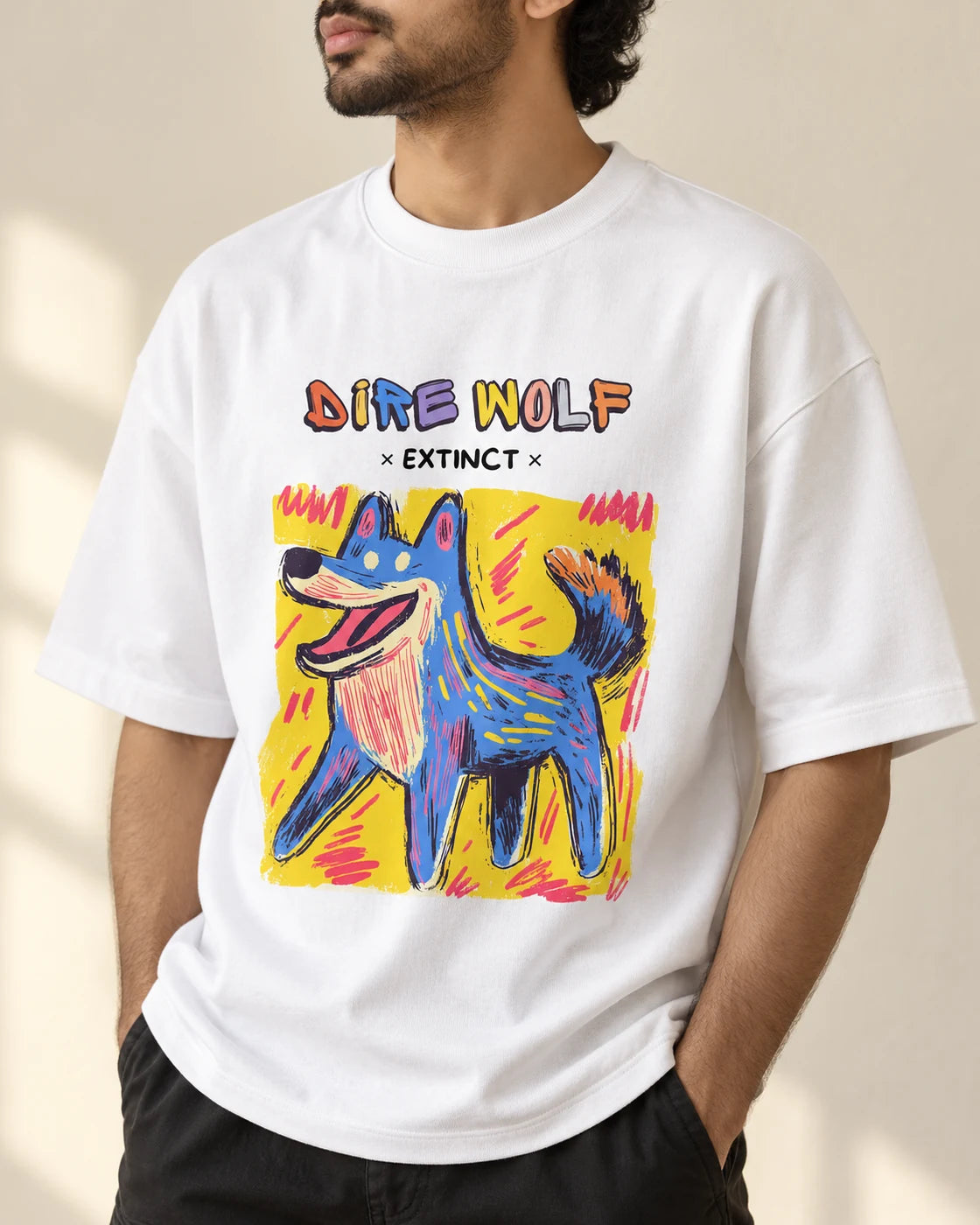 Close-up of the Dire Wolf Ancient Archives print on a white oversized French terry T-shirt