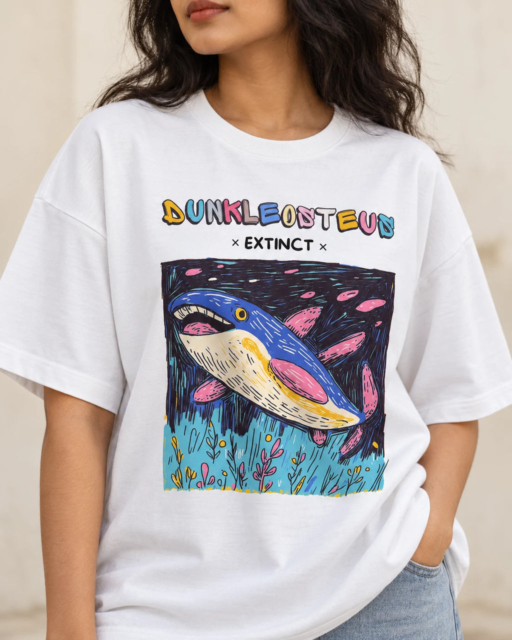 Close-up of the Dunkleosteus Ancient Archives print on a white oversized French terry T-shirt