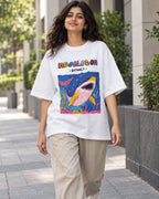 Model wearing the Megalodon white oversized French terry T-shirt on a city street, Fourth Dimension Club