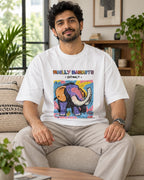 Model wearing the Woolly Mammoth white oversized French terry T-shirt seated on a sofa, Fourth Dimension Club