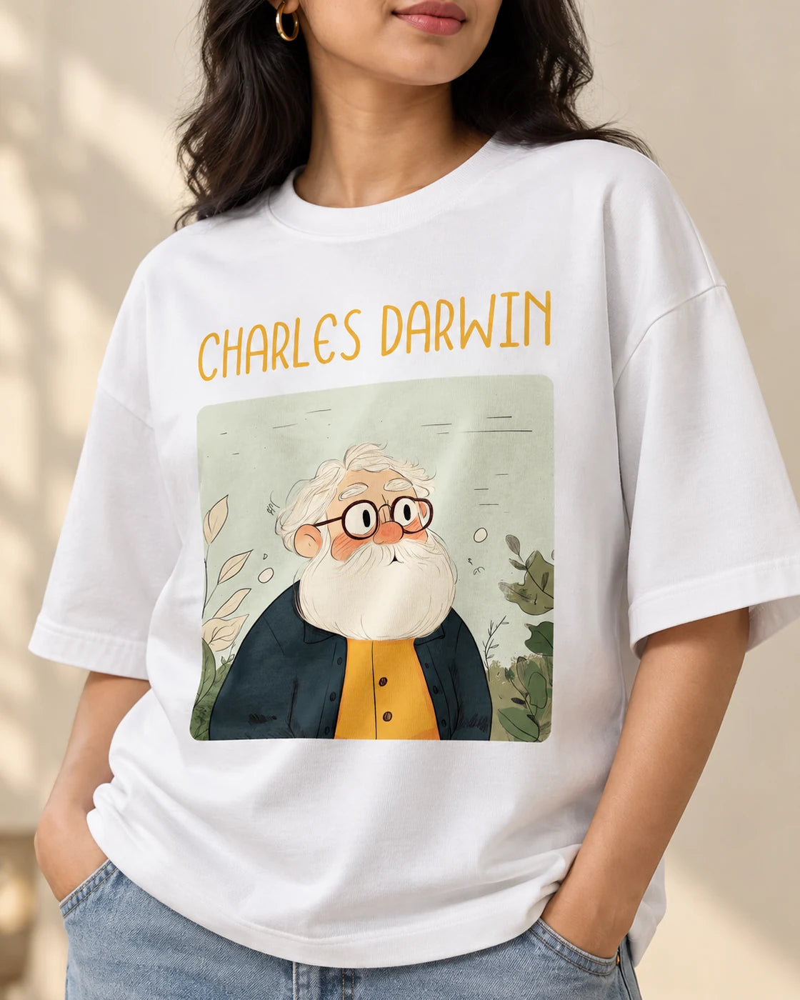 Close-up of the Charles Darwin Genius Doodles print on an oversized French terry T-shirt