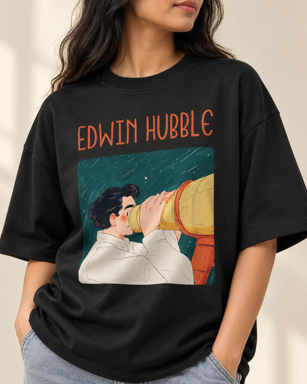 Close-up of the Edwin Hubble Genius Doodles print on an oversized French terry T-shirt