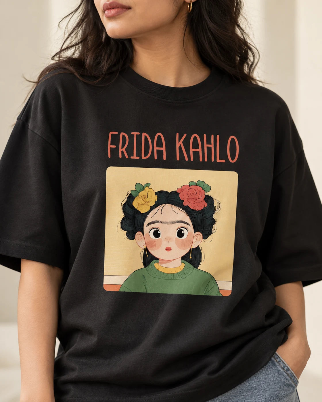 Close-up of the Frida Kahlo Genius Doodles print on an oversized French terry T-shirt