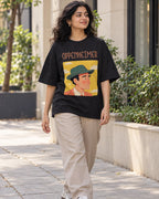 Model wearing the J. Robert Oppenheimer Genius Doodles oversized French terry T-shirt by Fourth Dimension Club on a city street