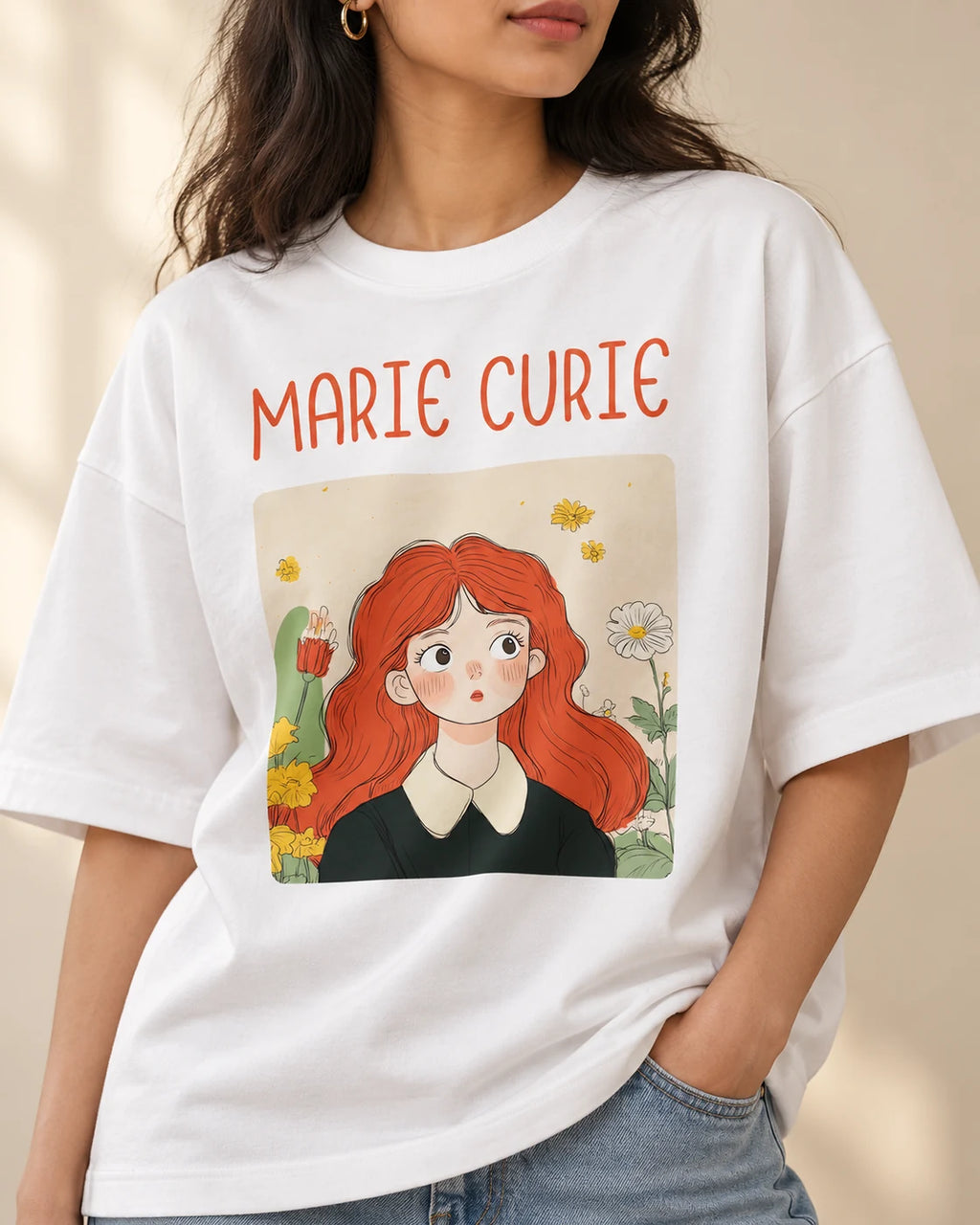 Close-up of the Marie Curie Genius Doodles print on an oversized French terry T-shirt