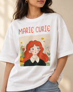 Close-up of the Marie Curie Genius Doodles print on an oversized French terry T-shirt