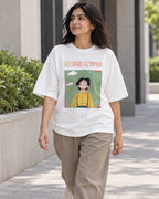 Model wearing the Richard Feynman Genius Doodles oversized French terry T-shirt by Fourth Dimension Club on a city street