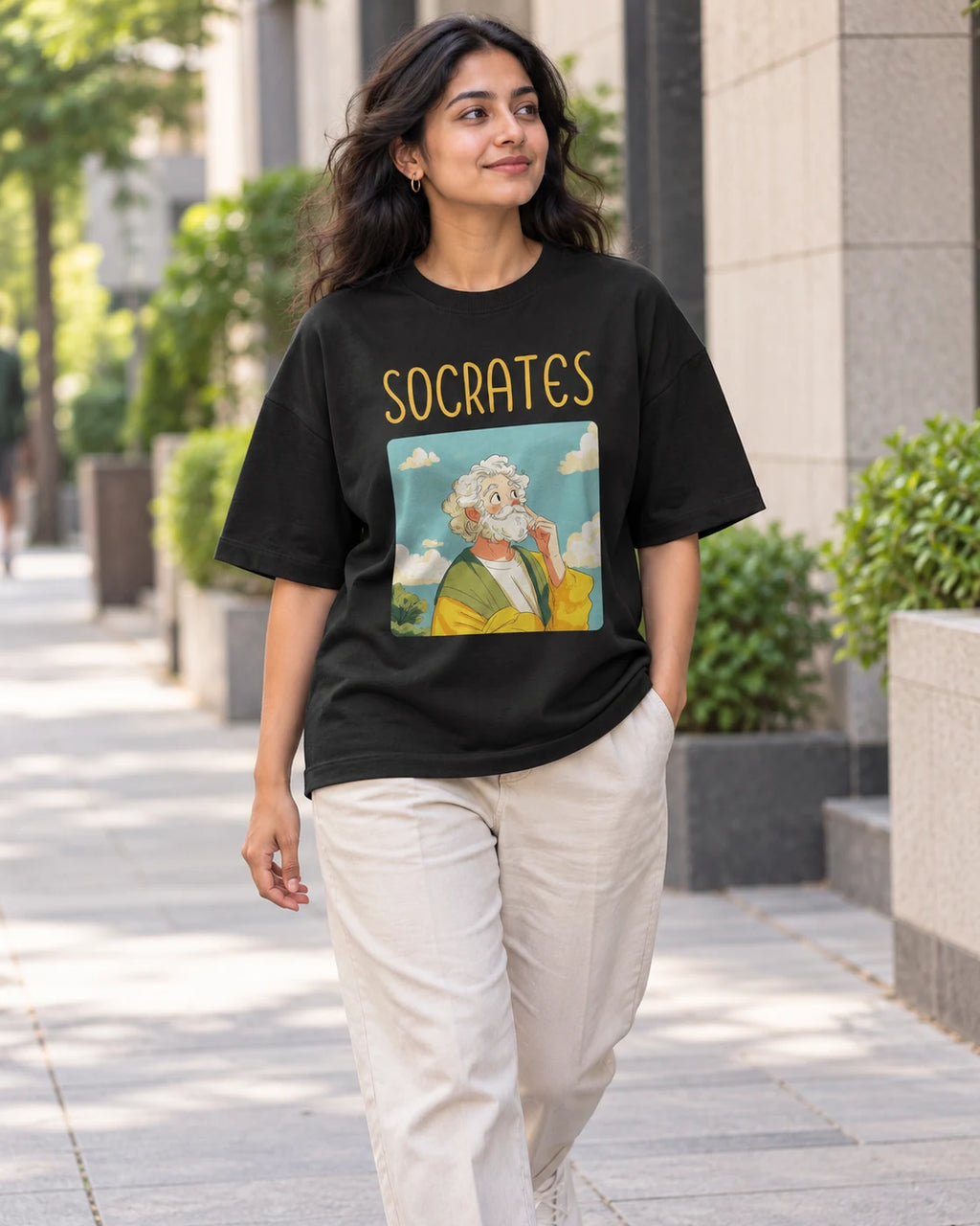 Model wearing the Socrates Genius Doodles oversized French terry T-shirt by Fourth Dimension Club on a city street