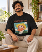 Model wearing the Vincent van Gogh Genius Doodles oversized French terry T-shirt by Fourth Dimension Club, seated on a sofa