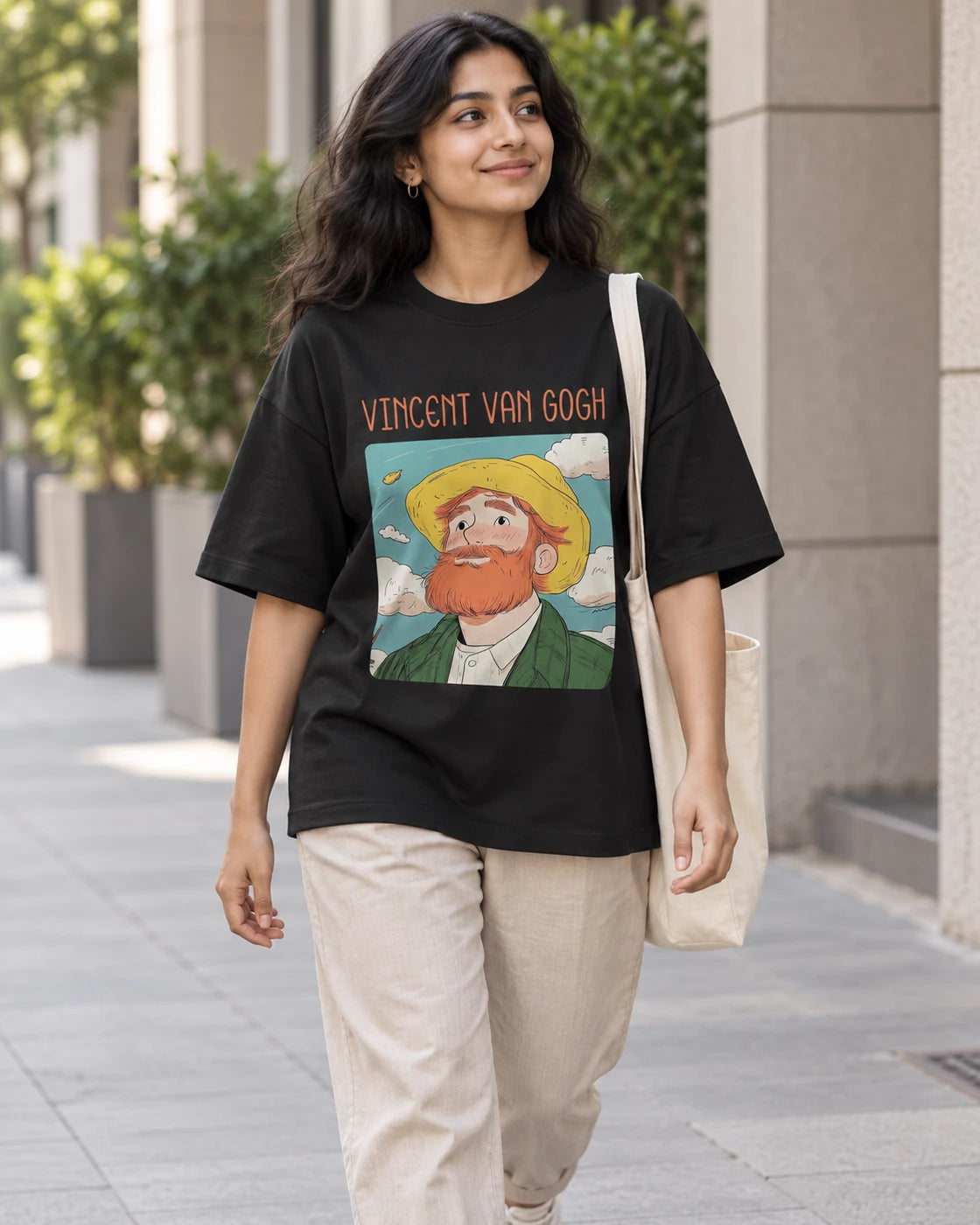 Model wearing the Vincent van Gogh Genius Doodles oversized French terry T-shirt by Fourth Dimension Club on a city street