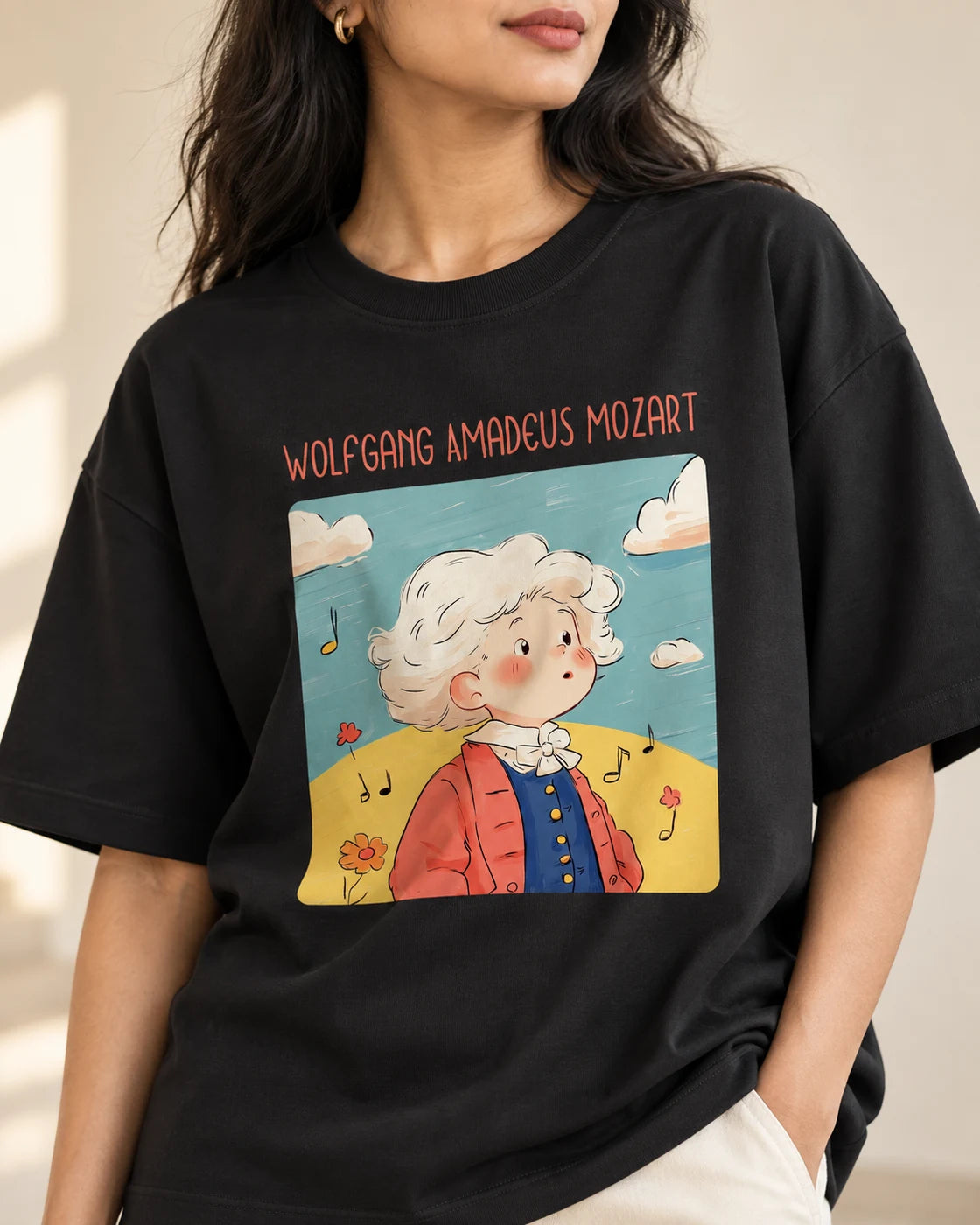 Close-up of the Wolfgang Amadeus Mozart Genius Doodles print on an oversized French terry T-shirt