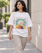 Model wearing the Wolfgang Amadeus Mozart Genius Doodles oversized French terry T-shirt by Fourth Dimension Club on a city street