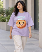 Model wearing the Mars Stellar Squad oversized French terry T-shirt in lavender by Fourth Dimension Club on a city street