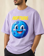 Close-up of the Neptune Stellar Squad print on a lavender oversized French terry T-shirt, Fourth Dimension Club