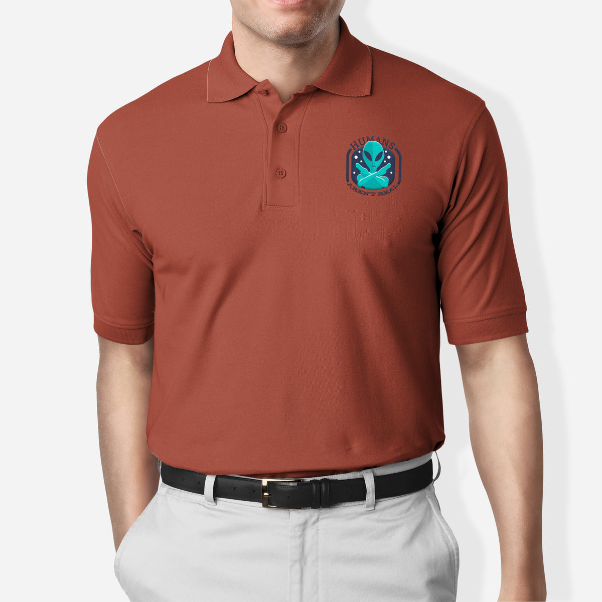 Humans Aren't Real Polo T-Shirt — Brick Red